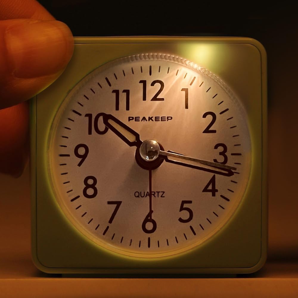 Ultra Small, Battery Travel Alarm Clock with Snooze and Light