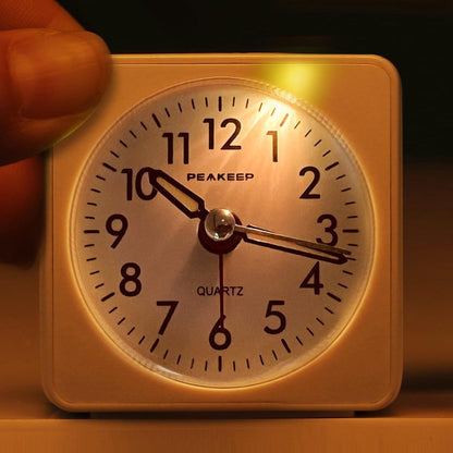Ultra Small, Battery Travel Alarm Clock with Snooze and Light